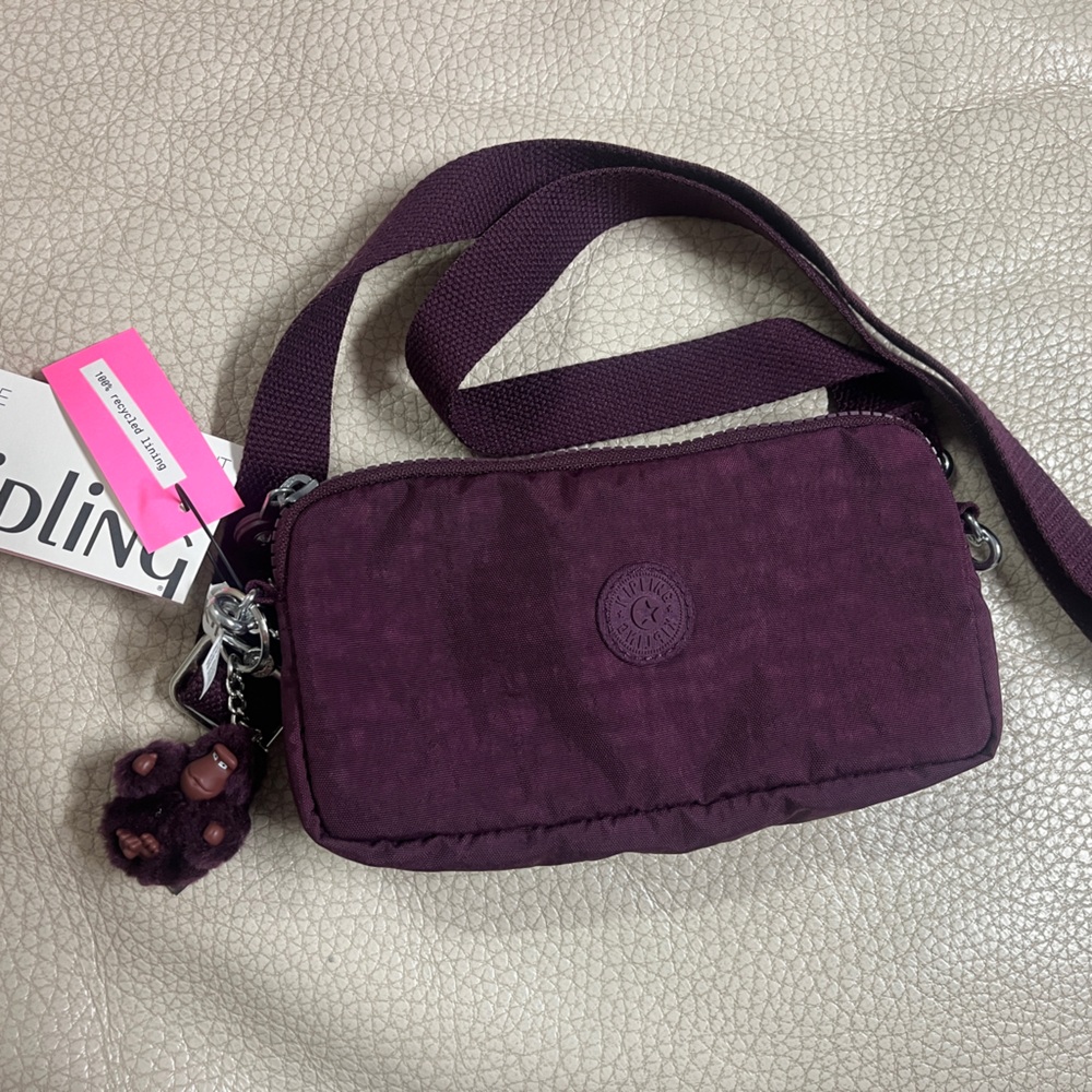 Kipling ‘Emilia’ in dark plum tonal